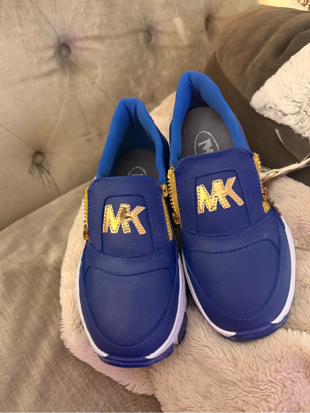 Michael Kors Blue Slip-On Sneakers with Gold MK Logo